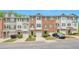 Charming townhomes with manicured lawns, attached garages and unique curb appeal at 3094 Lauren Parc Rd, Decatur, GA 30032