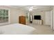 Bright bedroom with white walls, ceiling fan, two windows and light-colored carpet at 358 W West Wind Sw Dr, Lilburn, GA 30047