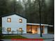 Contemporary home with a flat roof extension, large windows, and minimalist landscaping at 358 W West Wind Sw Dr, Lilburn, GA 30047