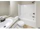Bright bathroom featuring a shower and bath combination and granite countertops at 6001 Oak Bend Ct, Riverdale, GA 30296