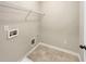Utility room includes hookups and ample space, ready for appliances at 6001 Oak Bend Ct, Riverdale, GA 30296