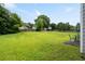 Large grass backyard with a patio and an outdoor seating area at 6606 Coventry Pt, Austell, GA 30168