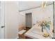 Bathroom with a single sink and a shower with a patterned curtain at 6606 Coventry Pt, Austell, GA 30168