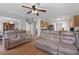 Spacious living room with plush sofas and neutral decor, ideal for relaxation and gatherings at 6606 Coventry Pt, Austell, GA 30168