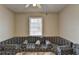 Unique living room design showcasing custom couch and a window with natural lighting at 2090 Marbut Ln, Lithonia, GA 30058