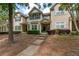 Attractive townhome showcasing manicured landscaping and inviting curb appeal on a sunny day at 2625 Cedar Dr, Lawrenceville, GA 30043