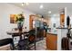Inviting eat-in kitchen with island, complemented by stainless steel appliances and wooden cabinetry at 2625 Cedar Dr, Lawrenceville, GA 30043