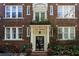 Charming brick apartment building with manicured landscaping and decorative details at 301 10Th Ne St # 12, Atlanta, GA 30309