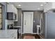 Modern kitchen featuring stainless steel appliances and tile backsplash at 301 10Th Ne St # 12, Atlanta, GA 30309