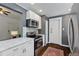 Stylish kitchen with stainless steel appliances and white countertops at 301 10Th Ne St # 12, Atlanta, GA 30309