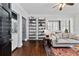 Spacious living room features hardwood floors, built-in shelving, and natural light at 301 10Th Ne St # 12, Atlanta, GA 30309