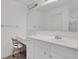 Bright bathroom with a vanity, large mirror and tiled flooring at 3208 Juniper Nw Dr, Kennesaw, GA 30144