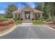 Community clubhouse with manicured landscaping and inviting entrance for residents at 3208 Juniper Nw Dr, Kennesaw, GA 30144