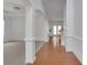 Bright foyer with hardwood floors, white trim, and an open floor plan at 3208 Juniper Nw Dr, Kennesaw, GA 30144