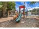 Community playground featuring a slide, climbing structures, and shaded area for ' enjoyment at 3208 Juniper Nw Dr, Kennesaw, GA 30144