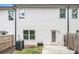 Home backyard featuring a small patio area and building's exterior at 7762 Fawn Cir, Covington, GA 30014
