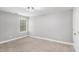 Bedroom featuring natural light, carpet flooring, and neutral walls at 7762 Fawn Cir, Covington, GA 30014