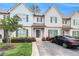 Charming townhouse with well-maintained landscaping, flowerbeds, and private driveway at 7762 Fawn Cir, Covington, GA 30014