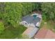 Aerial view of home with lush landscaping, a private pool, and an attached garage at 4439 Luther Ward Rd, Powder Springs, GA 30127
