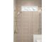 Shower with accent tile and brushed fixtures at 2335 Mason Dr # D27, Atlanta, GA 30316