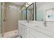 Luxurious bathroom featuring a double vanity and a glass enclosed walk-in shower at 2335 Mason Dr # D27, Atlanta, GA 30316