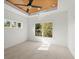 Bright bedroom featuring a ceiling fan and natural light from multiple windows at 2335 Mason Dr # D27, Atlanta, GA 30316