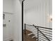 Hallway with contemporary railings and natural lighting at 2335 Mason Dr # D27, Atlanta, GA 30316