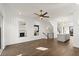 Open-concept living area with hardwood floors, fireplace, and seamless flow to the kitchen at 2335 Mason Dr # D27, Atlanta, GA 30316