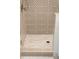 Walk-in shower featuring designer tile and contrasting grout at 2335 Mason Dr # D27, Atlanta, GA 30316