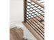 Close up of the wood and metal horizontal railing and steps at 2335 Mason Dr # D27, Atlanta, GA 30316