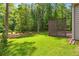 Lush backyard featuring lawn with trees, offering great outdoor opportunities at 2934 Wendover St, Marietta, GA 30062