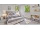 Neutral bedroom features stylish decor, soft gray hues, and natural light at 2934 Wendover St, Marietta, GA 30062