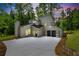 Striking modern home with a unique architectural design, pristine landscaping, and attached two car garage at 2934 Wendover St, Marietta, GA 30062