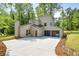 Modern home with unique architectural design, pristine landscaping, and attached two-car garage at 2934 Wendover St, Marietta, GA 30062