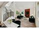 Sunlit living room with modern furnishings, wood accent wall, and a cozy fireplace at 2934 Wendover St, Marietta, GA 30062