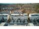 Aerial view of newly constructed townhouses, highlighting modern architecture and well-maintained landscaping at 4382 Benfield Se Way, Smyrna, GA 30080