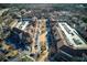 Aerial shot of local shopping center with busy parking lots and pedestrian-friendly sidewalks at 4382 Benfield Se Way, Smyrna, GA 30080