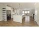 Spacious open-concept kitchen features stainless steel appliances and quartz countertops at 4382 Benfield Se Way, Smyrna, GA 30080