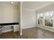 Bright office features wood floors, natural light, and a built-in desk area with storage at 4382 Benfield Se Way, Smyrna, GA 30080