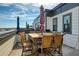 Rooftop patio with dining, outdoor umbrellas, and city views at 4382 Benfield Se Way, Smyrna, GA 30080