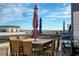 Rooftop patio with an outdoor kitchen, dining, and city views at 4382 Benfield Se Way, Smyrna, GA 30080
