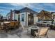 Expansive rooftop deck with dining area, fire pit, lounge seating, and umbrella, creating a perfect outdoor retreat at 4382 Benfield Se Way, Smyrna, GA 30080