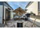 Cozy rooftop deck with plush seating, fire pit, and heater, perfect for relaxing and enjoying the outdoors at 4382 Benfield Se Way, Smyrna, GA 30080