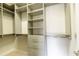 A walk-in closet with ample shelving, drawers, and hanging space at 4382 Benfield Se Way, Smyrna, GA 30080