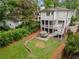 Back of house, screened in porch, patio, outdoor seating, garden, and green space at 686 Amsterdam Ne Ave, Atlanta, GA 30306