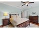 A secondary bedroom featuring wood floors, neutral walls, and wood furnishings at 686 Amsterdam Ne Ave, Atlanta, GA 30306