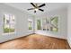 Bright bedroom with hardwood floors, large windows, and a modern ceiling fan at 686 Amsterdam Ne Ave, Atlanta, GA 30306