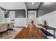Elegant dining room with wainscoting, hardwood floors, and a view of the home's interior at 686 Amsterdam Ne Ave, Atlanta, GA 30306