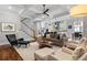 Spacious living room with coffered ceiling, fireplace and open floor plan concept at 686 Amsterdam Ne Ave, Atlanta, GA 30306