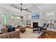 Bright and stylish living room with fireplace, coffered ceilings, and natural light at 686 Amsterdam Ne Ave, Atlanta, GA 30306